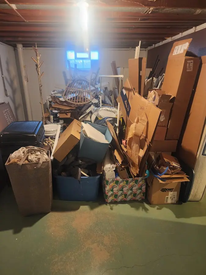 Roll-off dumpster container at job site for Roll Off Dumpster Rental in Grand Forks